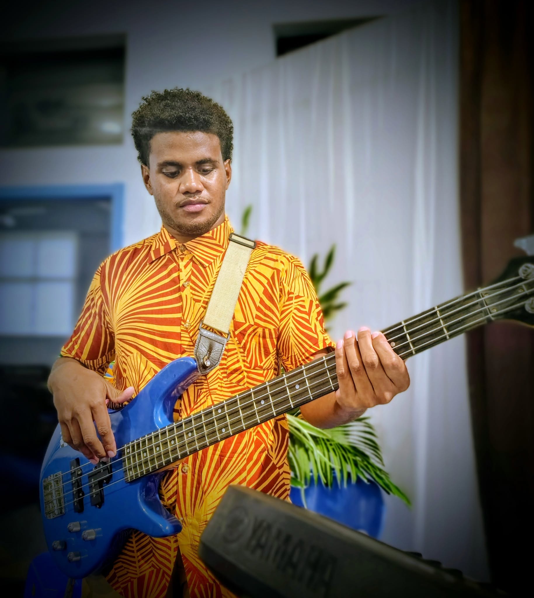 Junior Kiki, Bass Guitarist with ISX Band